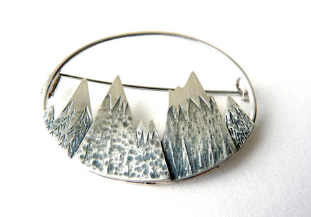 Oval mountain brooch £154