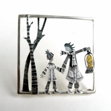 Leading with the light brooch £235