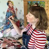 Lyn painting in her studio