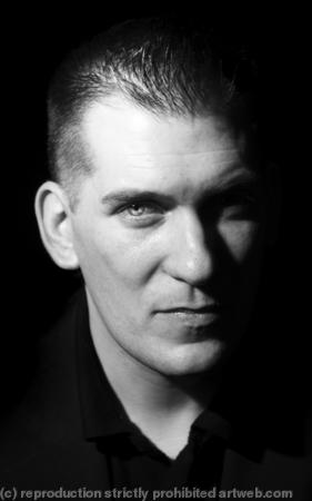 Peter Hunya, Hotel Night Manager. Photographed for the series 'The Migrants'