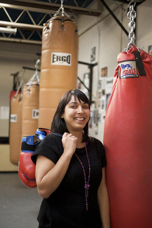 Nina, Robinson, producer BBC World Service. Photographed at a boxing club in Hackney where she is recording a series