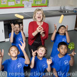 Berenice Bonallack photographed with the kids she is teaching to cook for Yours magazine