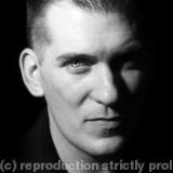 Peter Hunya, Hotel Night Manager. Photographed for the series 'The Migrants'