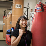 Nina, Robinson, producer BBC World Service. Photographed at a boxing club in Hackney where she is recording a series