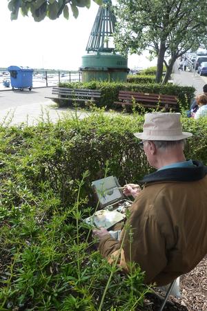 Trevor Chamberlain, hiding behind a hedge, Leigh on Sea