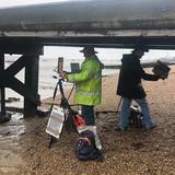 Tom Marsh and Andy Lee trying to get out of rain Gravesend