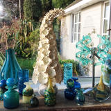 Ivory Hollyhock with blue glass
