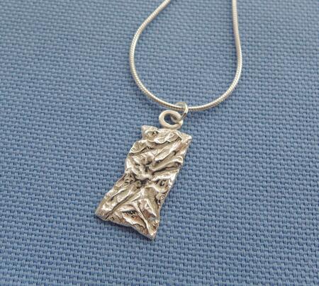 Asymmetrical pendant