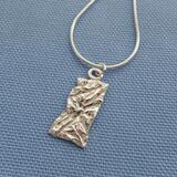 Asymmetrical pendant