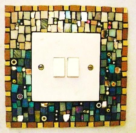 Mosaic light switch I made for my house to match the stair treads