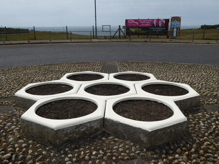 Painted planters waiting for the panels
