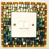 Mosaic light switch I made for my house to match the stair treads