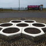 Painted planters waiting for the panels