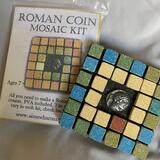 The Roman coin kit includes mosaic tiles , Roman coin of Athena, glue stick , toothpick , Roman dust, ( no grout included but can be grouted please follow instructions  accordingly to manufacturer guidelines)