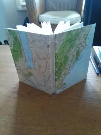 A commision made using maps of New Zealand on the covers, with a coptic style binding