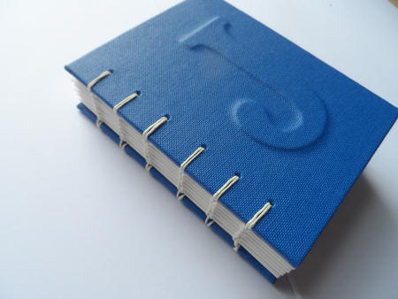 Coptic small A7 with raised embossed letter 'J'