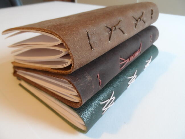 Holding picture wrapped leather pale brown