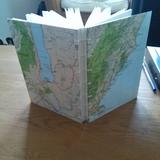 A commision made using maps of New Zealand on the covers, with a coptic style binding