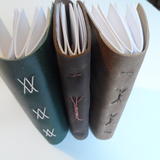 Leather cover wrapped cross 2