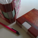 Examples of completed buttonhole stitch books