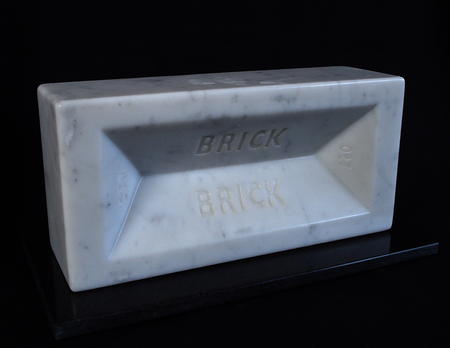 'Brick', Carved Carrara marble brick, life-size, on black granite base, individually numbered edition of 999, £500