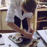 Student making moulds at Kings College Guildford