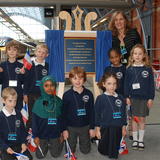 Berrin and children at the unveiled plaque.