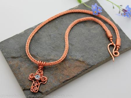 Celtic Cross - Copper wirework cross with faceted blue Topaz on a Viking knit chain