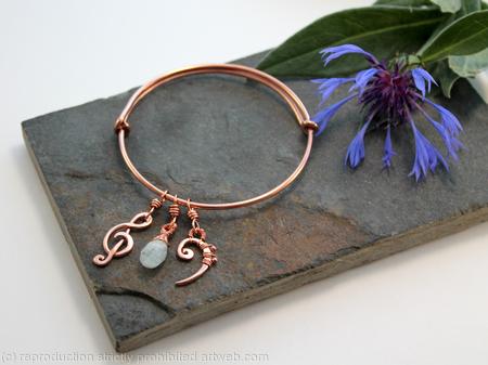 Adjustable bracelet with musical and birth stone charms