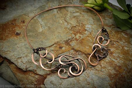 Asymetrical open swirl copper neck torc