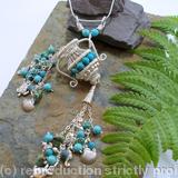 The Water Carrier tassel pendant