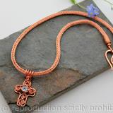 Celtic Cross - Copper wirework cross with faceted blue Topaz on a Viking knit chain