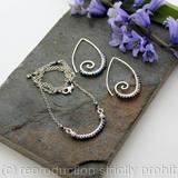 Sterling silver and Titanium coated spinal earrings and necklace