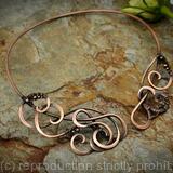 Asymetrical open swirl copper neck torc