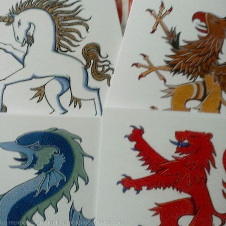 Fantasy animal greetings cards, set of four assorted, Unicorn, Griffin, Dolphin and Lion Rampant printed cards.
