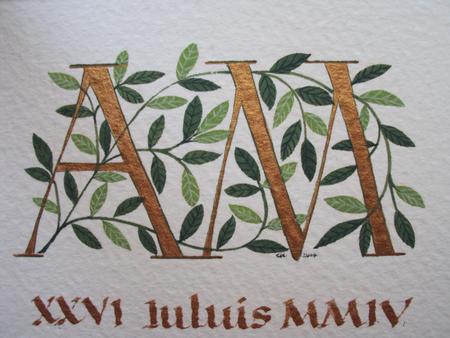 Two gold letters with leaves in shades of green wedding gift