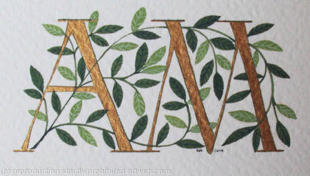 Two initials in gold with green leaves