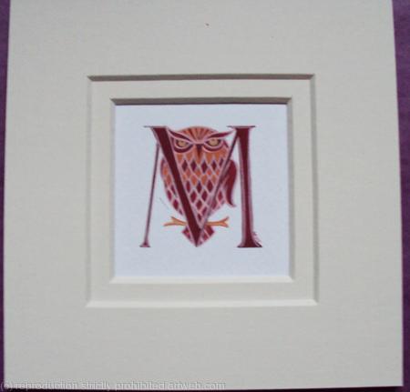 Initial letter handpainted with an owl