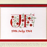 Two initials in red with poppies