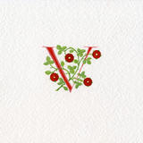 Letter V in red with red heraldic roses