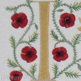 Detail of a 23c gold leaf letter handpainted with Poppies