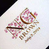 Double initials in 23c gold leaf handpainted with cherry blossom