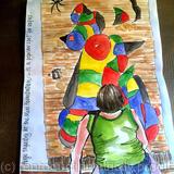 Admiring the Miro tapestry in Barcelona