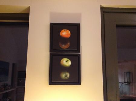 'Orange' & 'Apple' in small floating black frames
