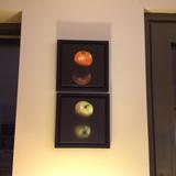 'Orange' & 'Apple' in small floating black frames