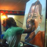 Genuine smile- Himba girl painting in progress