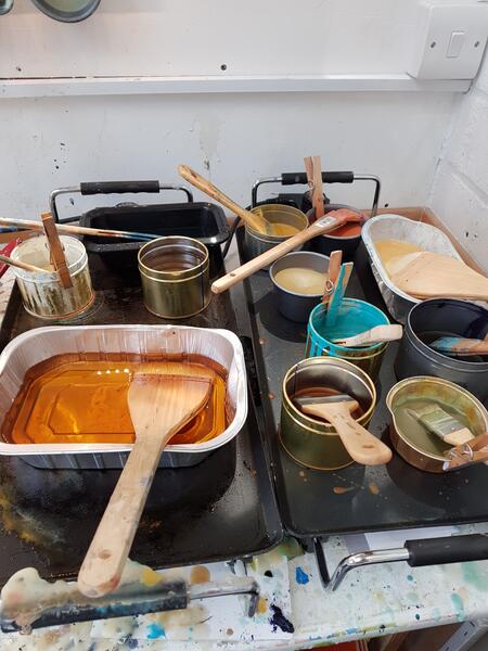 Molten beeswax on the hotplate
