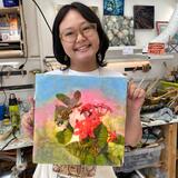 Ria with her photoencaustic piece