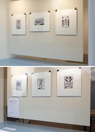 Linocut prints in the windows