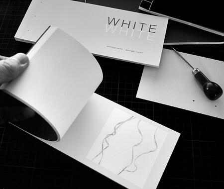 White, handmade book by George Logan